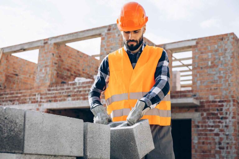 Concrete Worker Salary Guide: Man working with concrete