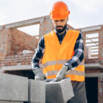 Concrete Worker Salary Guide: Man working with concrete