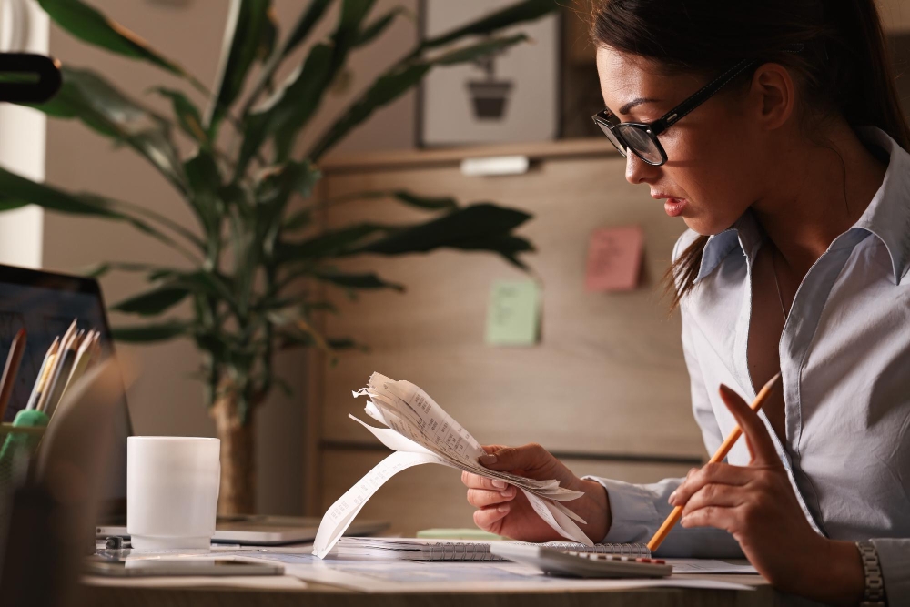Self-employed workers filling out Schedule SE tax form