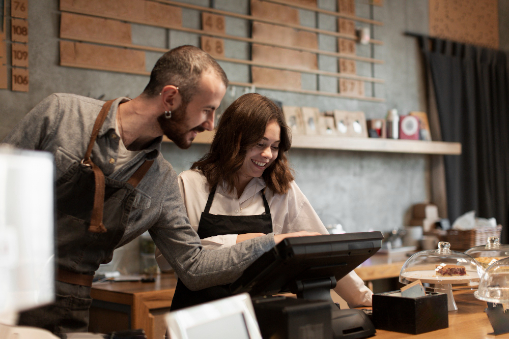 Small business owners doing DIY bookkeeping
