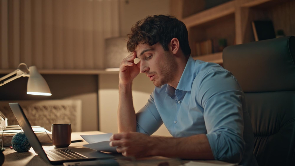 Small business owner facing cash flow problems and financial stress