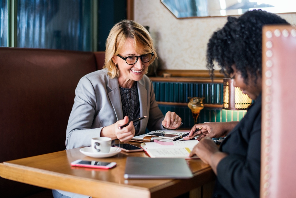Government program representative helping small business with financing.