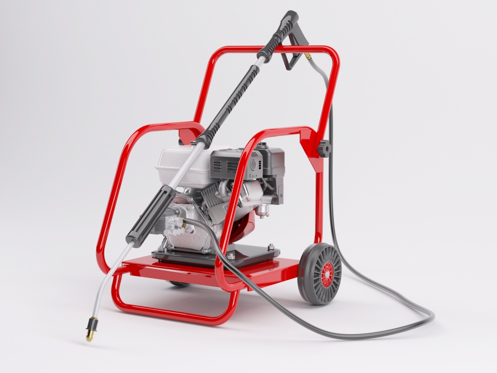 Pressure washer machine on a white background with pressure washing tools.