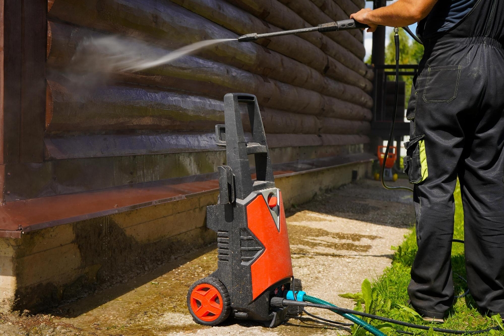 Pressure Washing Machine doing house maintenance.