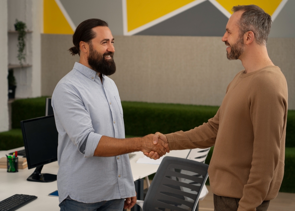 Small business owner collaborating with nearby business to co-market services