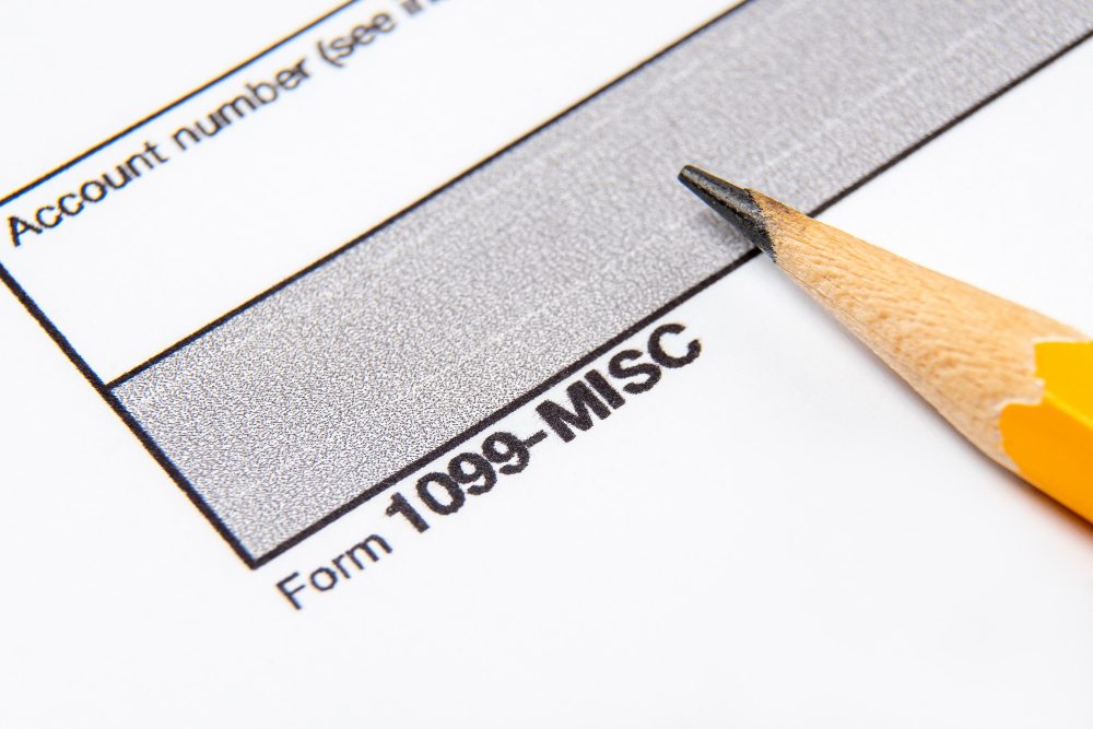 1099 form with pencil