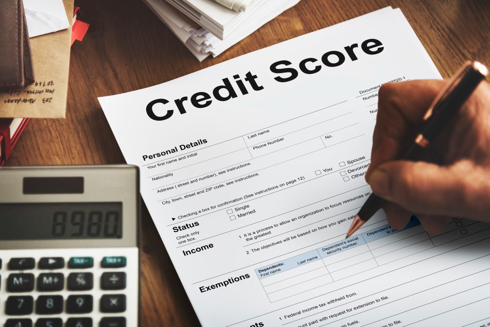 filling out credit score paperwork