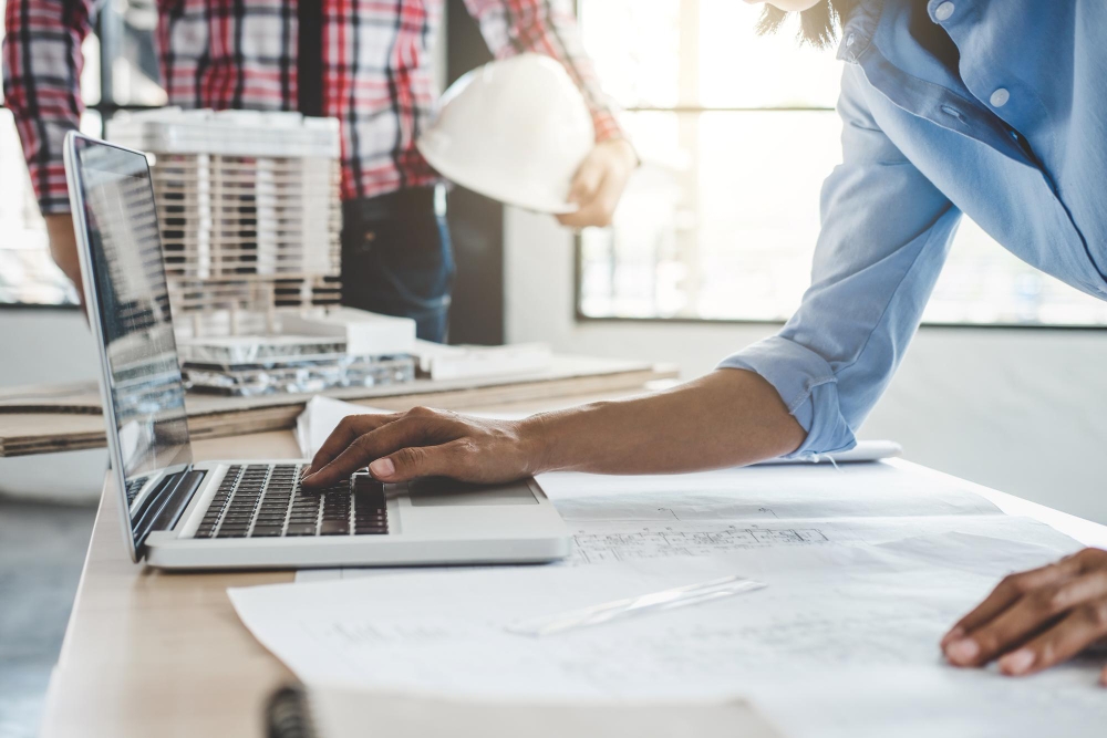 Contractor reviewing HVAC project website planning