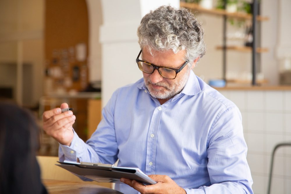 Business owner reviewing payments