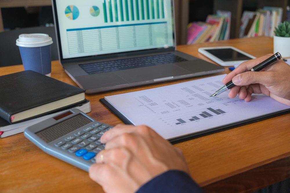 Accountant calculating asset depreciation in Excel