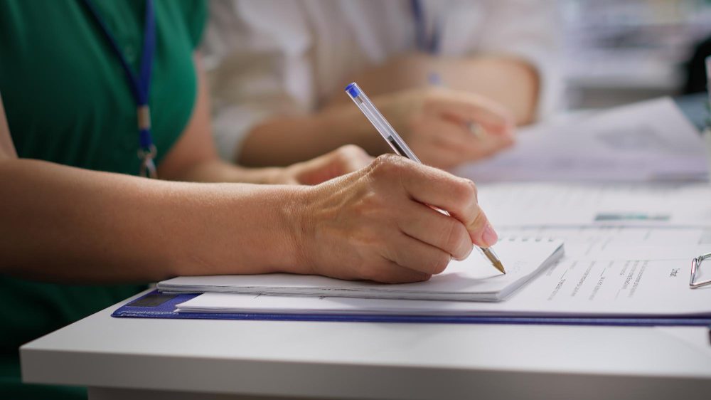 Medical billing team reviewing patient claims