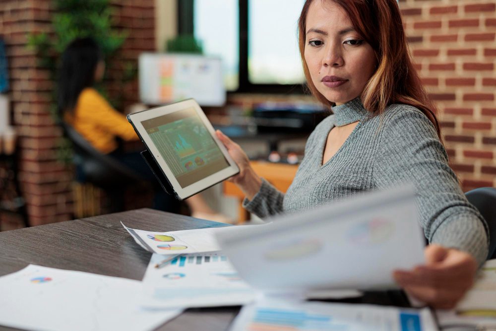 Analyst reviewing financial statements for profitability