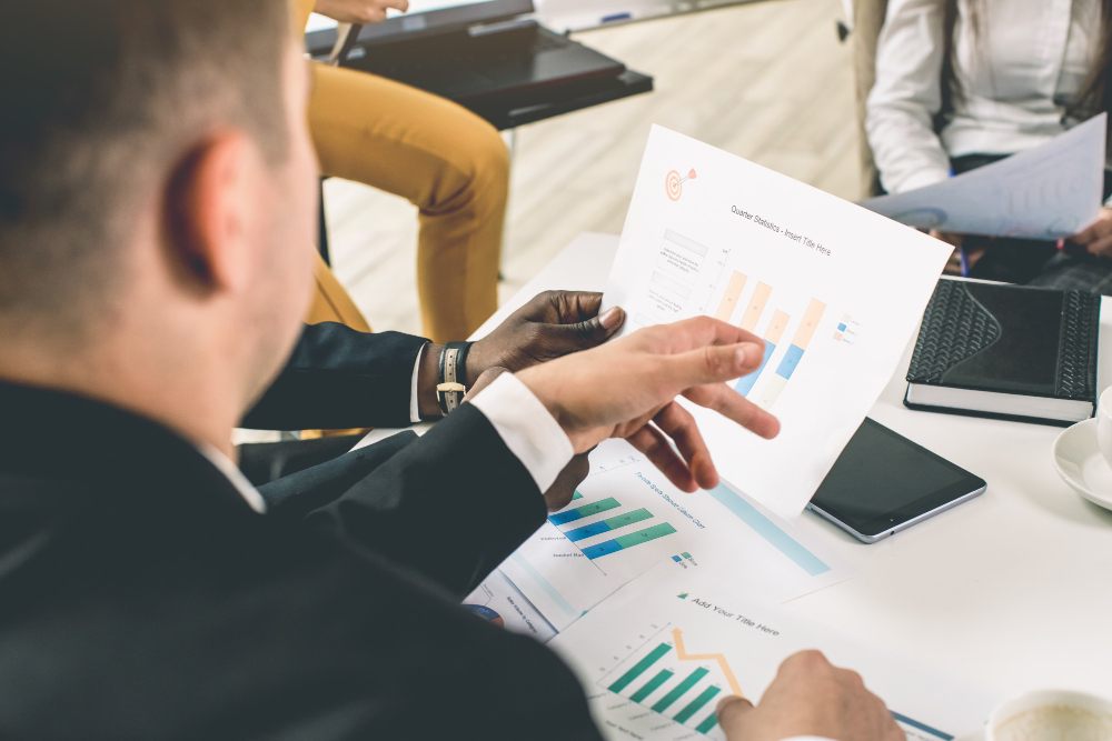 Person reviewing profit margins