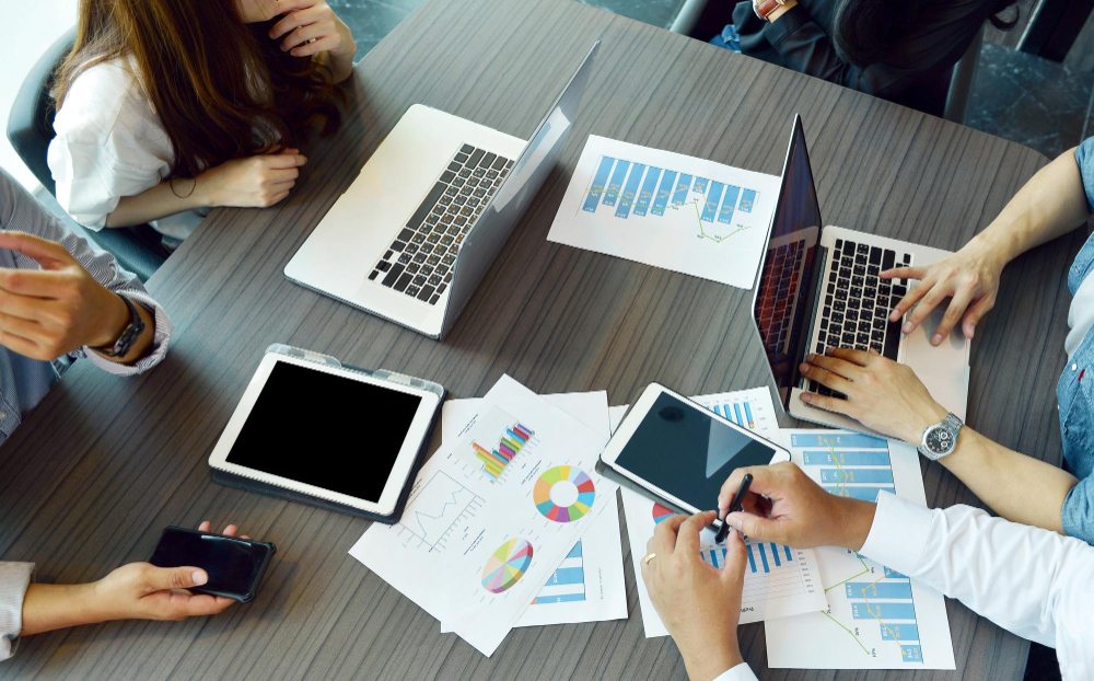 Team analyzing deferred revenue reports