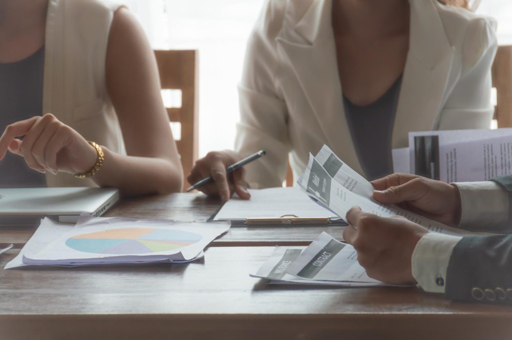 Accountants checking financial transactions for accuracy