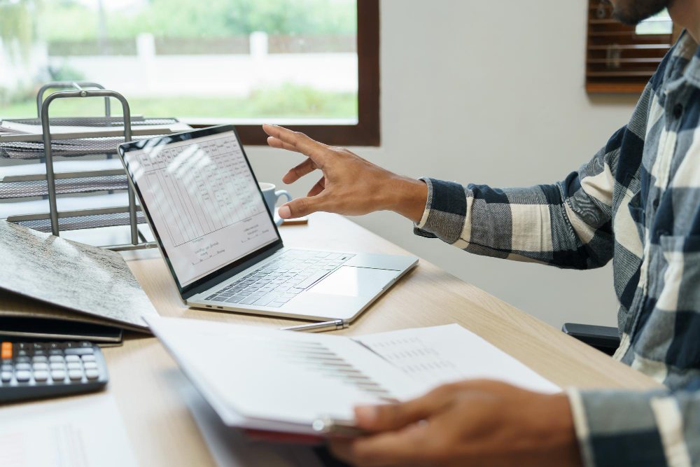 Business professional reviewing reverse charge VAT invoice