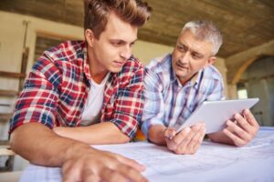 General contractor reviewing building contractor business plan