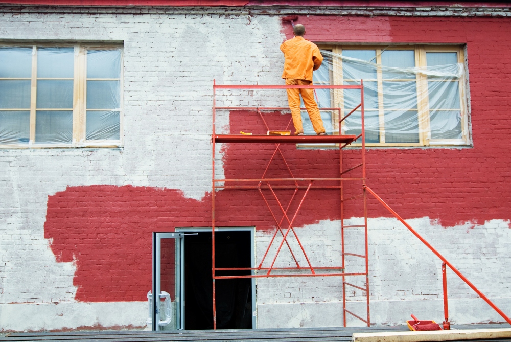 Exterior house painting services by professional contractor