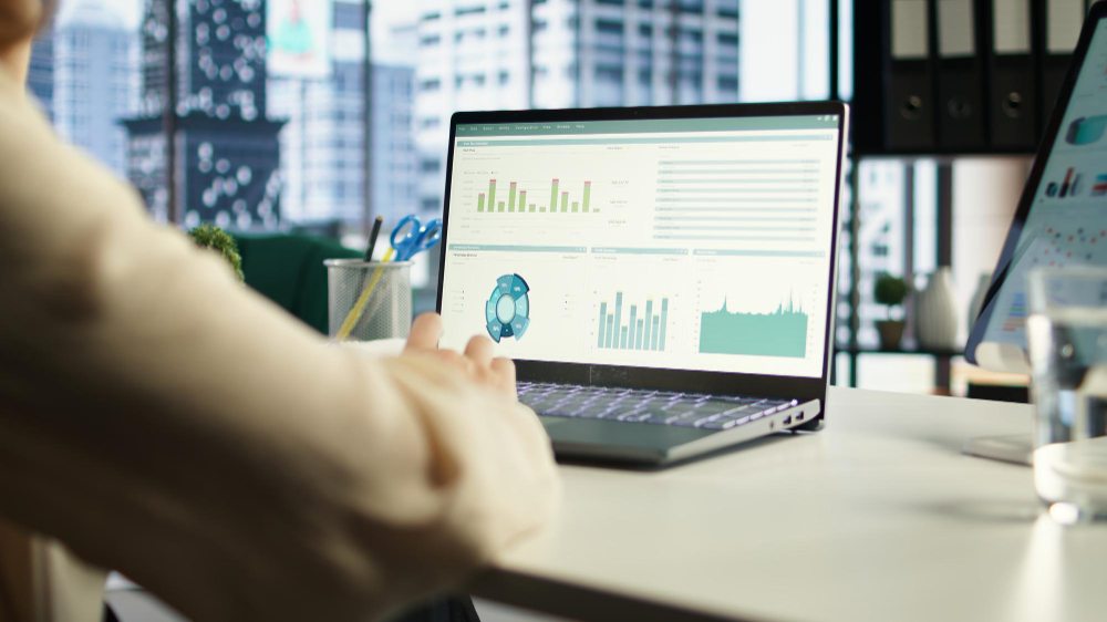 Financial director reviewing reports and planning funds