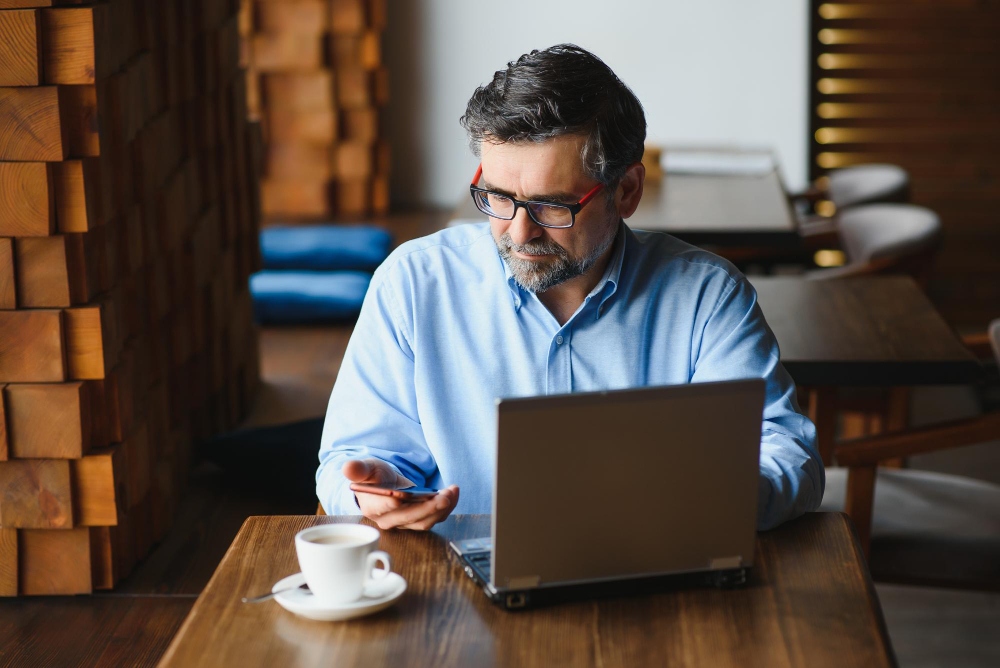 Small business owner sending a digital e invoice