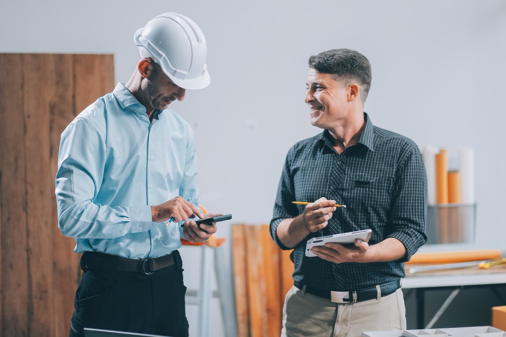 Painting contractor reviewing estimate with client

