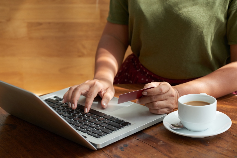 Person entering payment details during online checkout