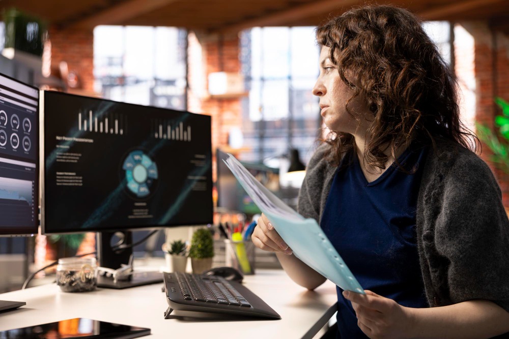 controller reviewing ai invoice reconciliation dashboard