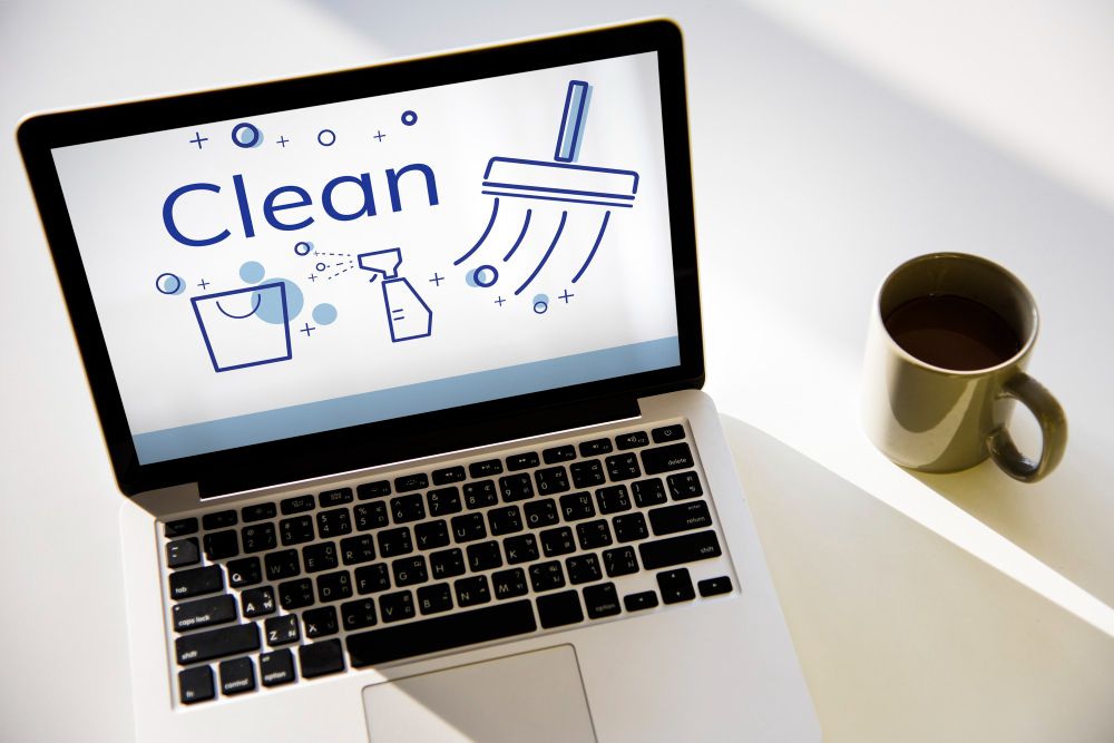 owner setting up email marketing campaign to grow cleaning business sales