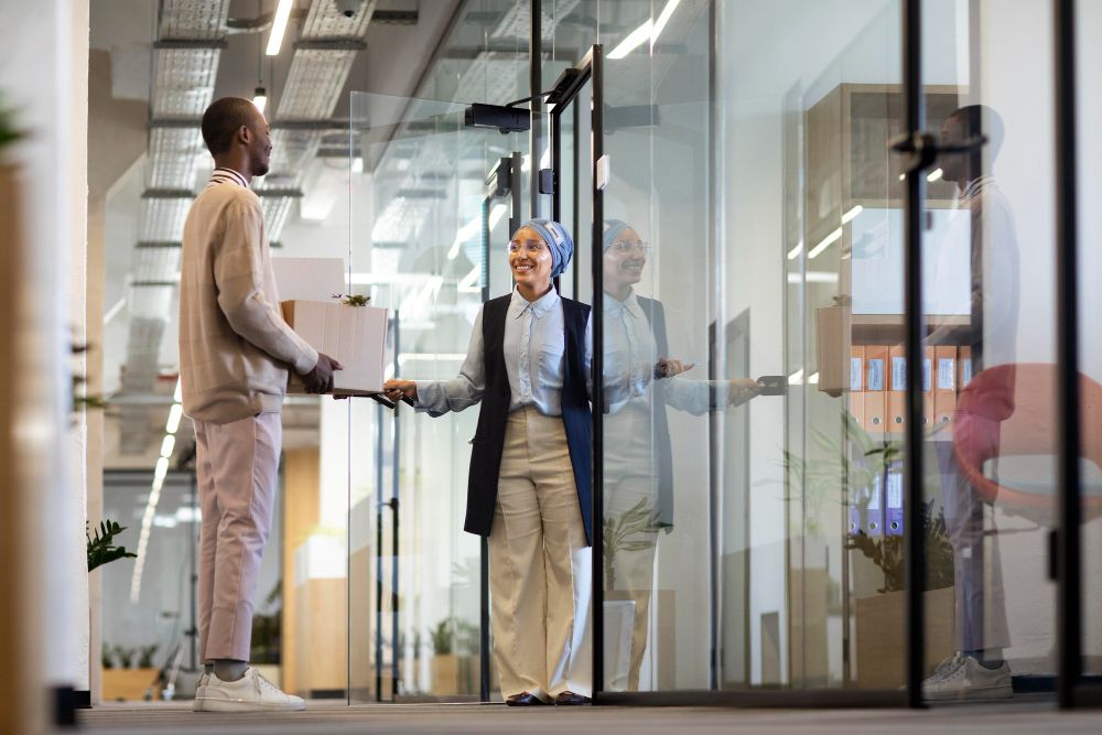 cleaner doing sales walkthrough of commercial office for janitorial quote
