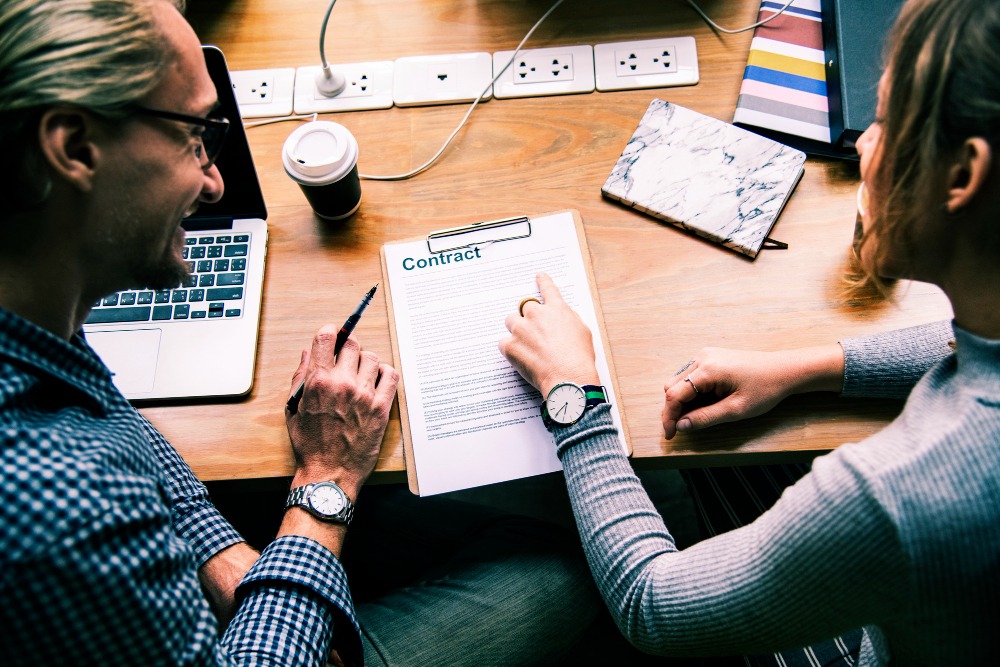 general contractor signing a written contract agreement