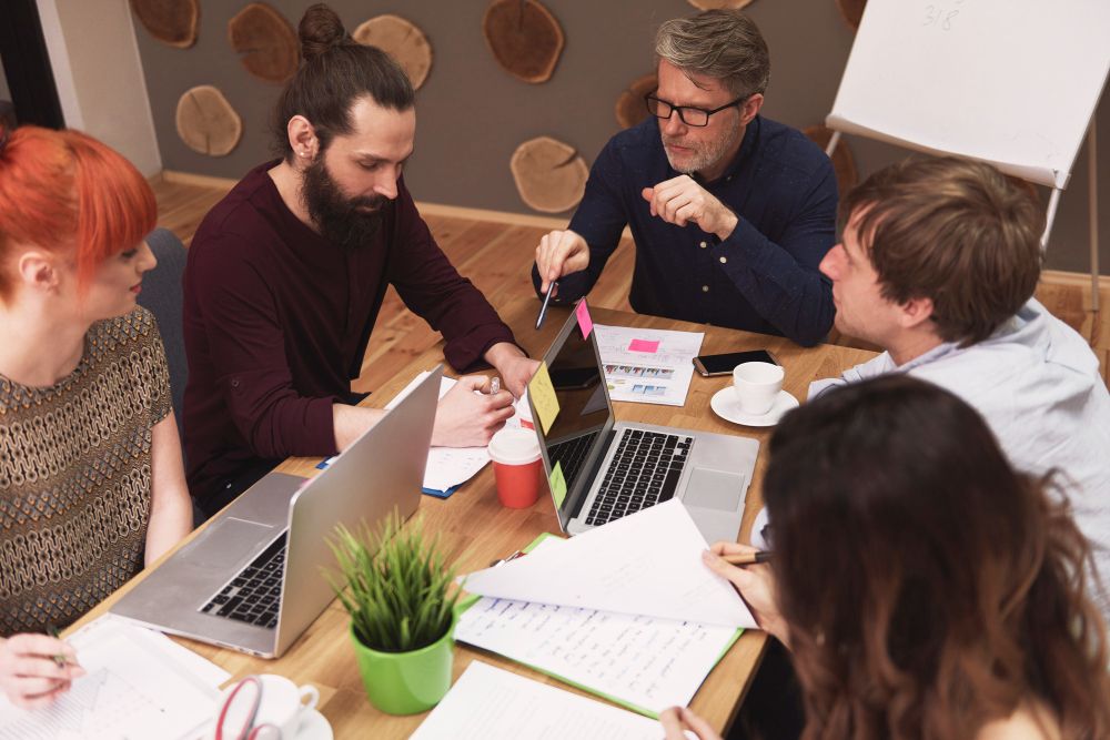 Marketing team reviewing SEO strategy and campaign results