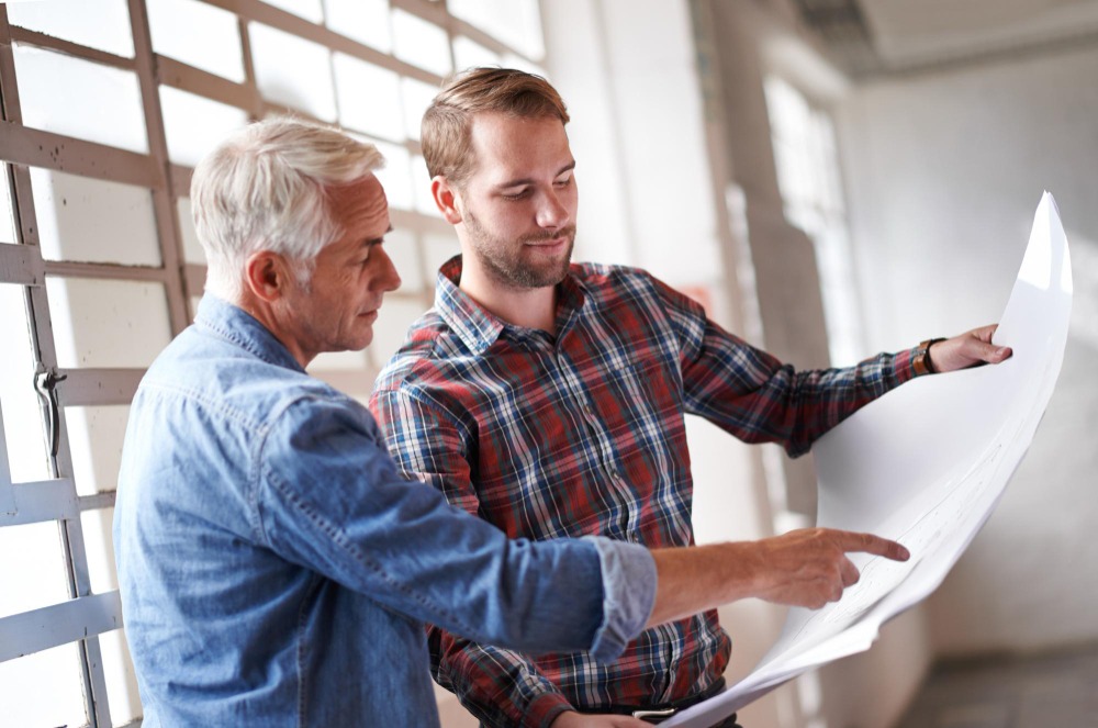 general contractor reviewing project estimate with homeowner