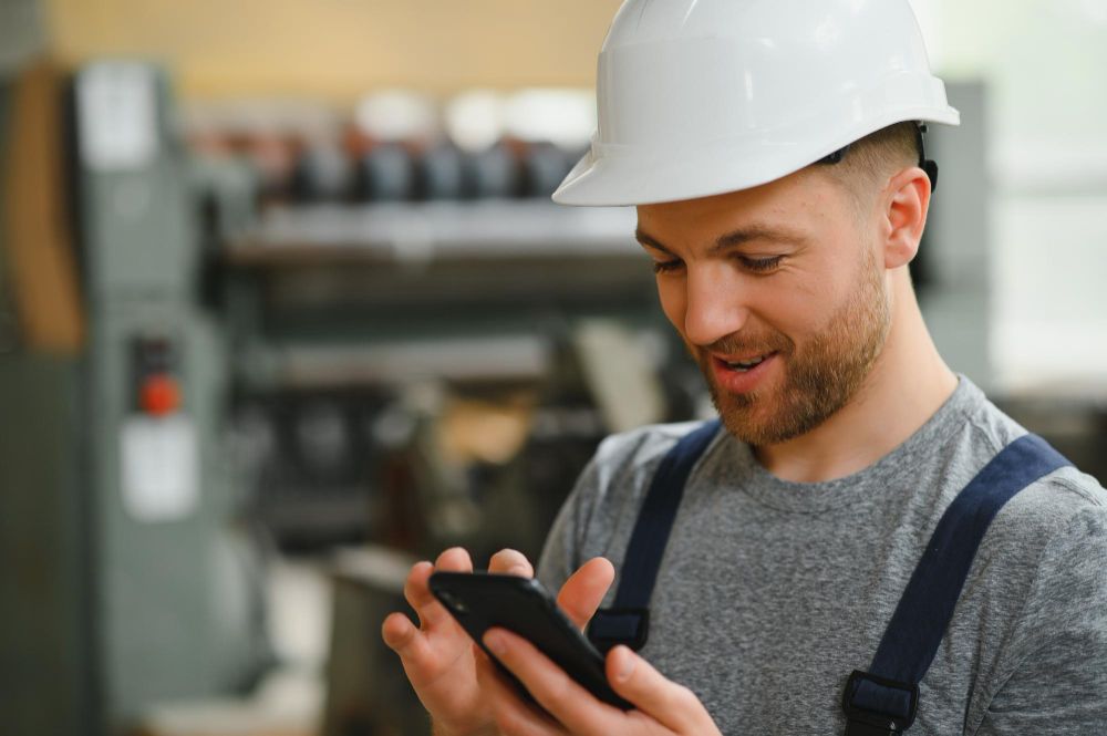 Handyman technician smiling in professional work environment