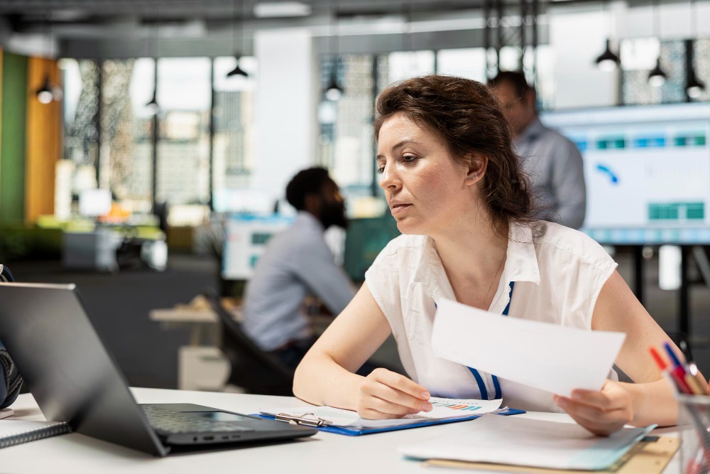 accountant running payroll for small business employees