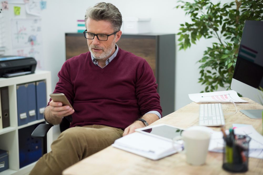 business owner making follow up call about payments