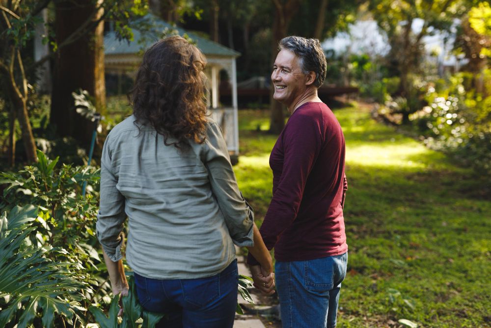 Homeowners enjoying a healthy, well-maintained garden