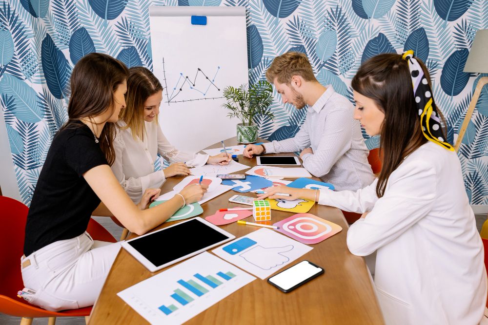 small team planning marketing strategy for construction business