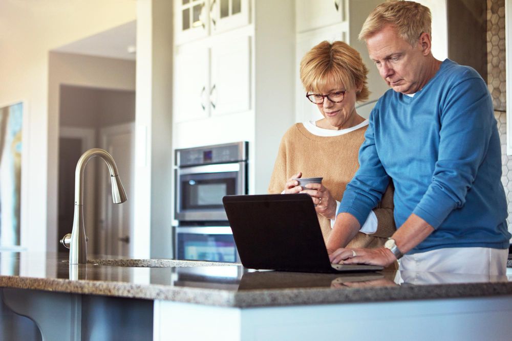 Homeowners booking an appliance repair service online