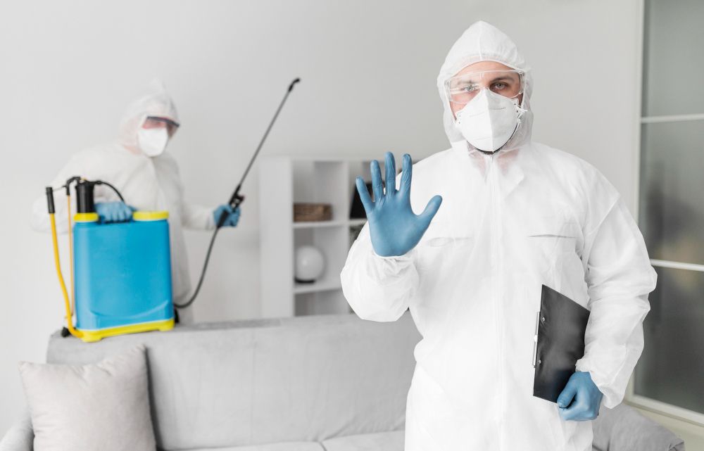 Pest control technician wearing protective equipment