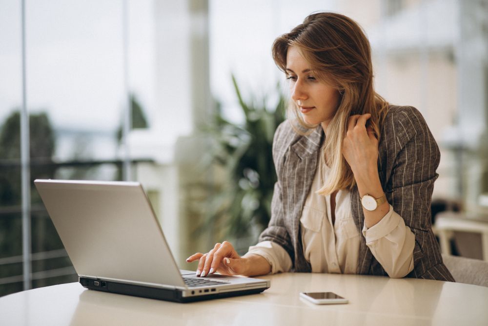 small business owner reviewing operating costs