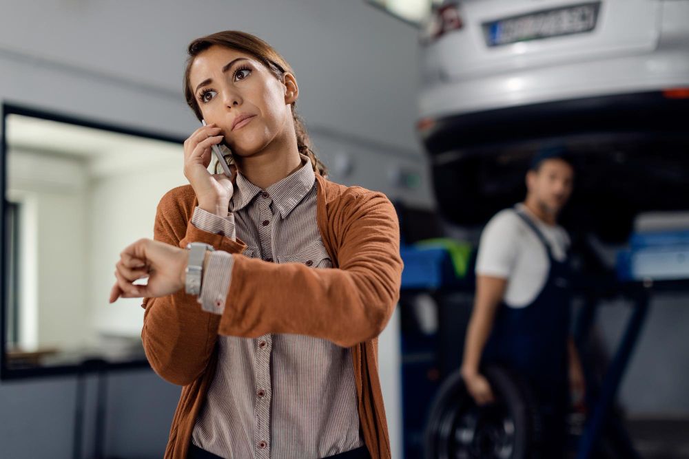 worker checking overtime hours to calculate time and a half