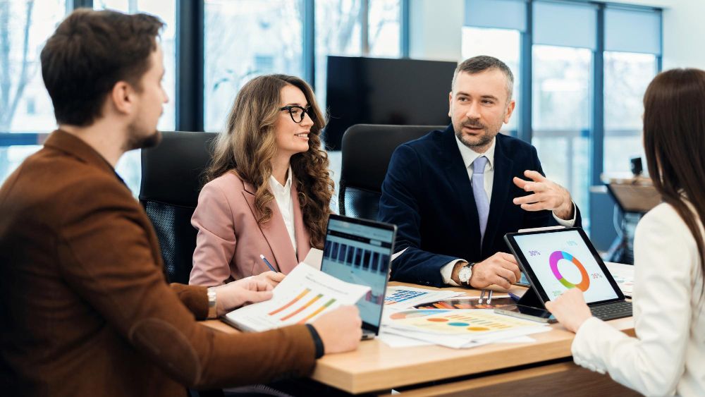 sales team using quotation management software
