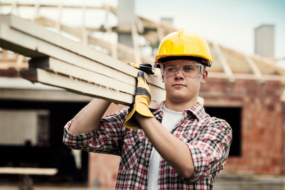 Construction worker gaining hands-on roofing experience