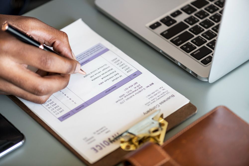 business owner reviewing billing statement