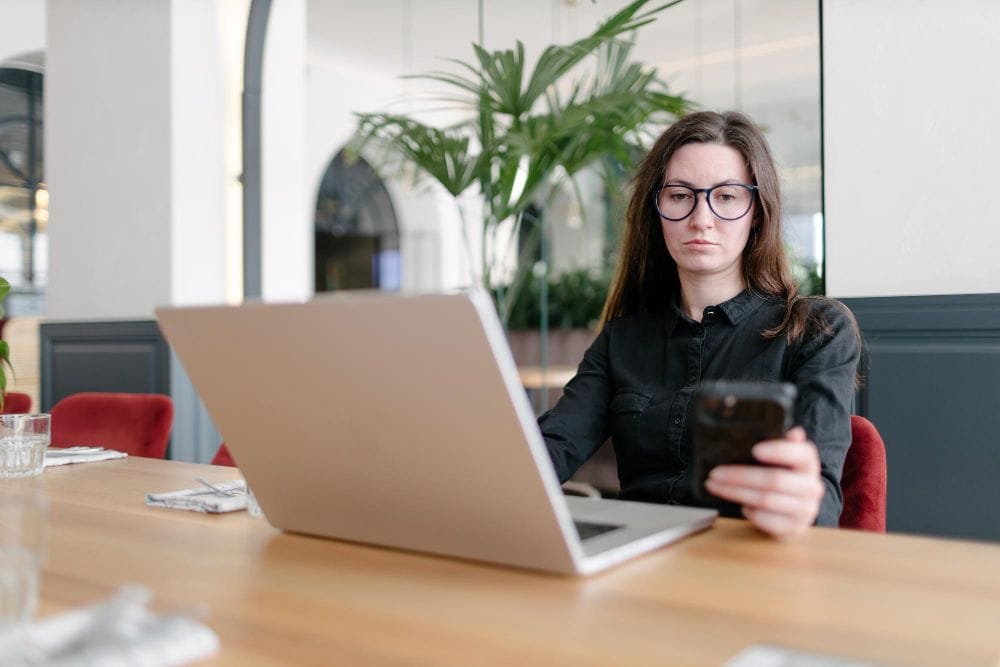 Freelancer using a laptop to manage client projects and business tasks