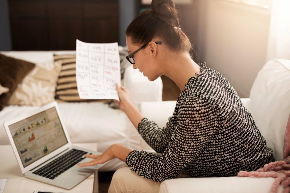 Freelancer using a computer to manage business records and expenses