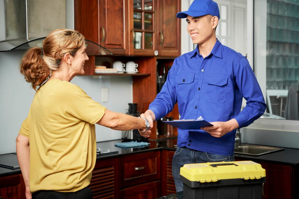 Home service professional finalizing an agreement with a customer