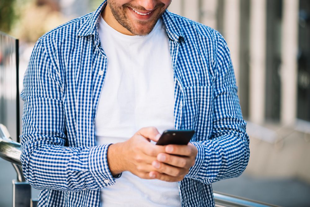 small business owner using smartphone