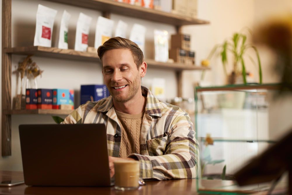 small business owner working on laptop